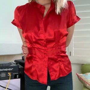 Red silk blouse